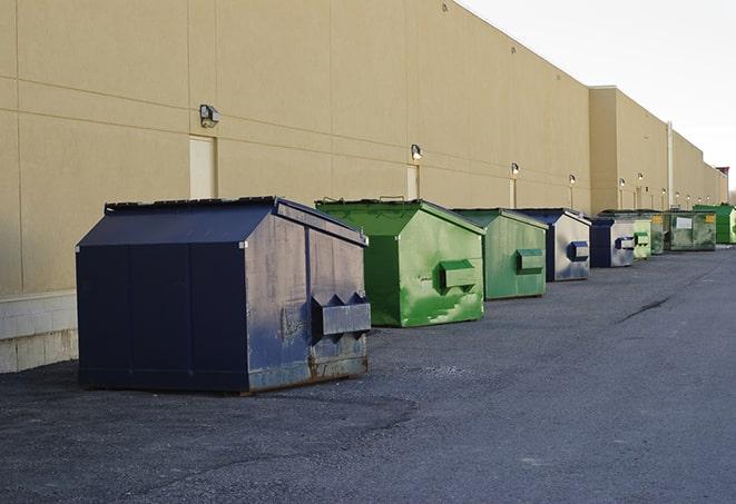 an assortment of sturdy and reliable waste containers near a construction area in Aurora, SD